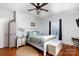 Serene main bedroom with a comfortable bed, stylish furnishings, and soothing natural light at 206 Mcconnell St, Clover, SC 29710