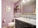 Stylish powder room with elegant fixtures and vanity at 2139 Peninsula Dr, Clover, SC 29710