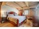 Spacious bedroom with wooden ceiling beams and natural light at 2139 Peninsula Dr, Clover, SC 29710