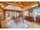 Dining room featuring wood beams, hardwood floors, and natural light at 2139 Peninsula Dr, Clover, SC 29710