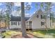 Charming home exterior with vertical siding and an inviting front porch at 2139 Peninsula Dr, Clover, SC 29710