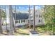 Charming home with a cozy front porch, complemented by a well-maintained yard and mature trees at 2139 Peninsula Dr, Clover, SC 29710