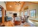 Inviting living room with wood ceiling, recessed lighting, and lots of natural light from large windows at 2139 Peninsula Dr, Clover, SC 29710