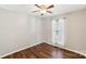 Cozy bedroom with natural light filtering through the window and wood flooring at 214 Bubbling Well Rd, Denver, NC 28037