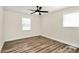 A bright bedroom with hardwood floors and a ceiling fan at 2159 Greenleaf Rd, Clover, SC 29710