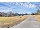 A single story house with an empty, partially brown front yard at 2159 Greenleaf Rd, Clover, SC 29710