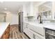 Kitchen featuring white cabinets, stainless steel appliances, and a stylish farmhouse sink at 2159 Greenleaf Rd, Clover, SC 29710