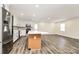 Modern kitchen boasts stainless steel appliances, a center island, and bright, open space at 2159 Greenleaf Rd, Clover, SC 29710
