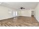 Bright living area featuring hardwood floors, modern ceiling fan, and access to the outdoors at 2159 Greenleaf Rd, Clover, SC 29710