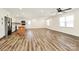 Bright, open living area featuring stylish flooring and a ceiling fan at 2159 Greenleaf Rd, Clover, SC 29710