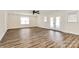 Spacious living room with multiple windows and a ceiling fan at 2159 Greenleaf Rd, Clover, SC 29710