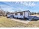 Cozy home with a covered patio and neatly maintained landscaping at 2159 Greenleaf Rd, Clover, SC 29710