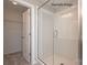 Modern bathroom featuring a glass-enclosed shower with white subway tile and updated fixtures at 2216 Camber Dr # Cwo0074, Gastonia, NC 28054