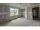 Bright bedroom showcasing a window and an open doorway in a newly constructed home at 2216 Camber Dr # Cwo0074, Gastonia, NC 28054