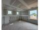 Bedroom showcasing multiple bright windows and unfinished drywall in a new construction home at 2216 Camber Dr # Cwo0074, Gastonia, NC 28054