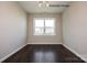 Bright dining room featuring wood floors and a large window at 2216 Camber Dr # Cwo0074, Gastonia, NC 28054