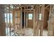 Interior wood framing of a new home with visible plumbing and electrical work at 2216 Camber Dr # Cwo0074, Gastonia, NC 28054