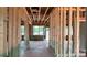 Unfinished interior with exposed wood frame, natural light streams in through the newly installed windows at 2216 Camber Dr # Cwo0074, Gastonia, NC 28054