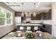 Modern kitchen with stainless steel appliances, a central island, and chic pendant lighting at 2216 Camber Dr # Cwo0074, Gastonia, NC 28054