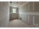 Unfinished laundry room with a window bringing in natural light at 2216 Camber Dr # Cwo0074, Gastonia, NC 28054