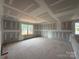 Unfinished living room with natural light coming through the window at 2216 Camber Dr # Cwo0074, Gastonia, NC 28054