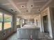 Large living area under construction, featuring large windows and a view to the outside at 2216 Camber Dr # Cwo0074, Gastonia, NC 28054
