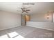 Loft featuring neutral paint, carpet flooring, a ceiling fan, and decorative lighting at 2216 Camber Dr # Cwo0074, Gastonia, NC 28054