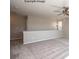 Spacious loft featuring carpet flooring, neutral paint, a ceiling fan, and decorative lighting at 2216 Camber Dr # Cwo0074, Gastonia, NC 28054