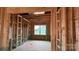 Framing stage of a room showing a window and electrical work at 2216 Camber Dr # Cwo0074, Gastonia, NC 28054