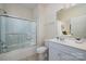 Bathroom features shower/tub combination with glass doors, a toilet and vanity at 2937 Bellasera Way, Matthews, NC 28105