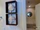 Bathroom wall art detail, with shower and bath in the background at 2937 Bellasera Way, Matthews, NC 28105