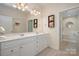 Bathroom featuring a double vanity, cabinets and drawers, and a separate shower and tub at 2937 Bellasera Way, Matthews, NC 28105
