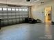 Spacious garage with ample room for parking and storage; includes living space at 2937 Bellasera Way, Matthews, NC 28105