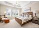 Bedroom with a wood-framed bed and a ceiling fan at 2937 Bellasera Way, Matthews, NC 28105