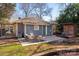 Backyard patio with outdoor seating and a well-manicured lawn at 316 S Summit Ave, Charlotte, NC 28208