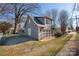 A two-story home with a large garage and a fenced backyard at 316 S Summit Ave, Charlotte, NC 28208