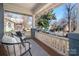 Comfortable front porch showcasing outdoor seating and neighborhood views at 316 S Summit Ave, Charlotte, NC 28208