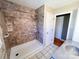 Bathroom showcases a walk-in shower and a tiled floor for added convenience at 4069 Amsbury Rd, Concord, NC 28025