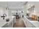 Modern kitchen featuring a large center island, modern appliances, and lots of cabinet space at 429 Grey Reagan Trl, Charlotte, NC 28211