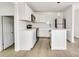 Beautiful updated kitchen featuring new cabinets, stainless appliances and an island at 4501 Knollcrest Dr, Charlotte, NC 28208
