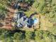 A gorgeous secluded home with a large backyard and private in-ground pool at 4552 Sawgrass Ct, Denver, NC 28037