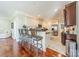 Bright kitchen with an island, stainless steel appliances, and barstool seating at 4552 Sawgrass Ct, Denver, NC 28037
