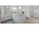 Bathroom featuring vanity, a mirror with sconces, and decoratively tiled floors at 5128 Providence Retreat Ln, Charlotte, NC 28270