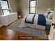 Bedroom with a sleek dresser, neutral tones, and a cozy rug at 5135 Tucker Ave, Kannapolis, NC 28081