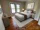 Bright bedroom with hardwood floors and natural light at 5135 Tucker Ave, Kannapolis, NC 28081
