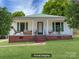 Charming single-story home with a welcoming front porch and well-maintained lawn at 5135 Tucker Ave, Kannapolis, NC 28081