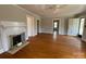 Living room featuring hardwood floors and a fireplace at 5135 Tucker Ave, Kannapolis, NC 28081