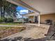 Inviting covered patio featuring neutral tones, concrete pavers, and outdoor seating, perfect for entertaining at 528 Sherrill Ave, Lincolnton, NC 28092