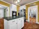Stylish kitchen featuring white cabinets, dark countertops, and stainless steel appliances at 528 Sherrill Ave, Lincolnton, NC 28092