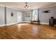 Spacious living room featuring new hardwood flooring and abundant natural light at 528 Sherrill Ave, Lincolnton, NC 28092